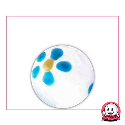 La Canica Pâquerette Blanca y Azul de 25 mm es una canica artística, de fabricación artesanal.