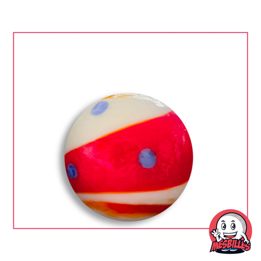Bille Big-Bang Rouge et Bleu 25 mm Collector en verre rouge et blanc crème à pois bleus, vue de dessus, 25 mm de diamètre