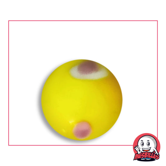 Bille Galactika Jaune 25 mm Collector en verre jaune soleil opaque à tache vieux rose dans un ovale blanc et tache rose, vue de dessus, 25 mm de diamètre