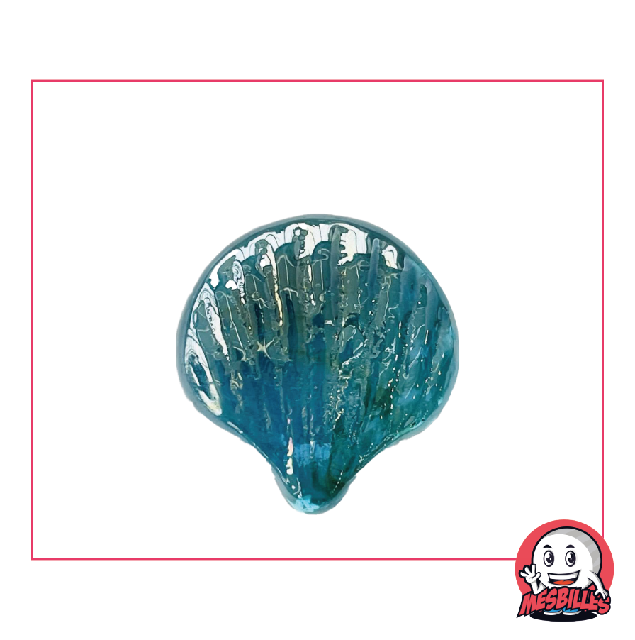 Canica con forma de concha azul claro, el océano de las canicas con formas en MisCanicas