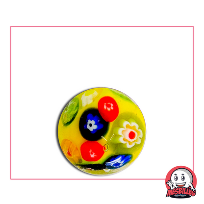 Canica grande amarilla de 22 mm decorada con flores multicolores