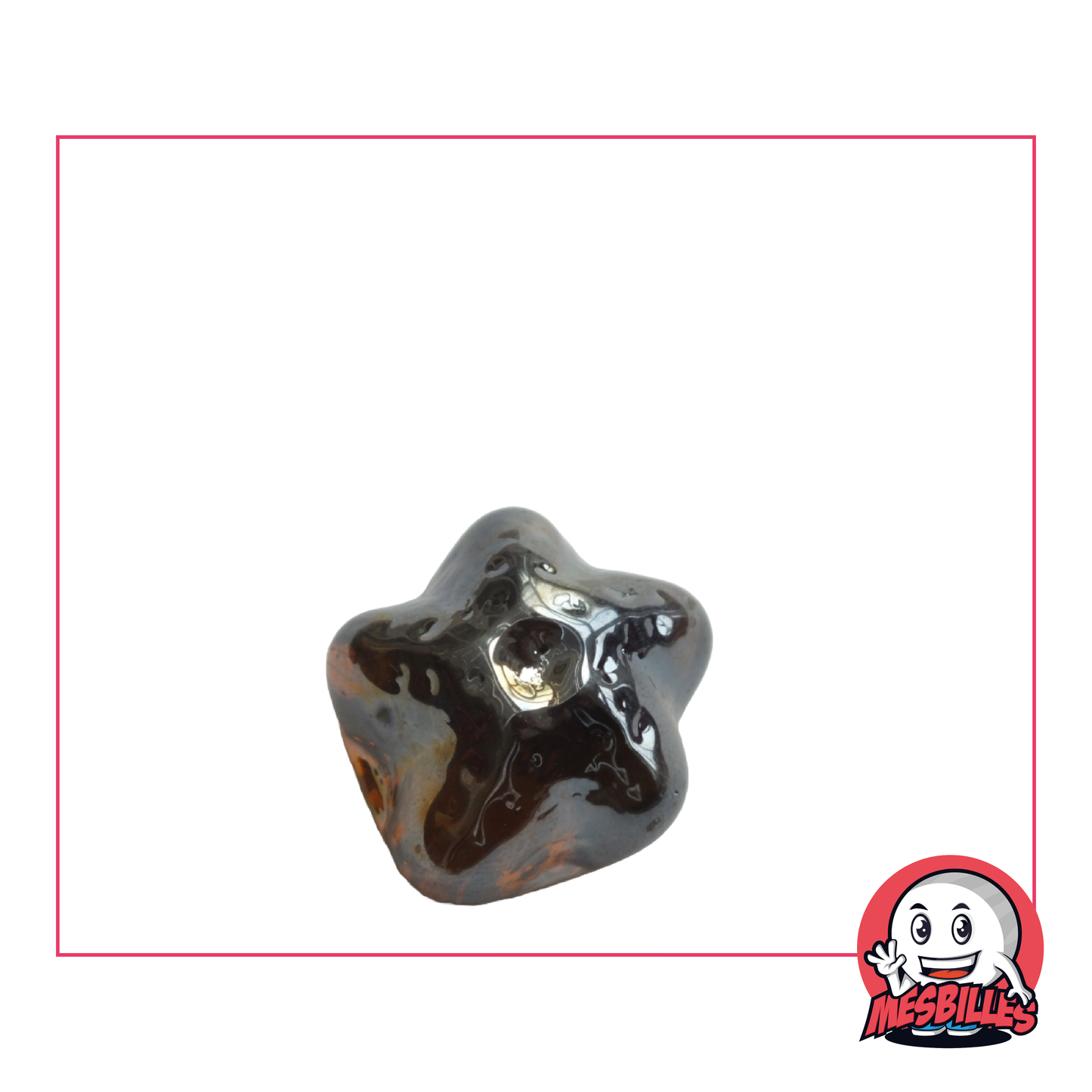 Foto de una Canica Estrella Marina de color Ámbar Noche translúcido, de forma plana, que mide aproximadamente 30 mm.