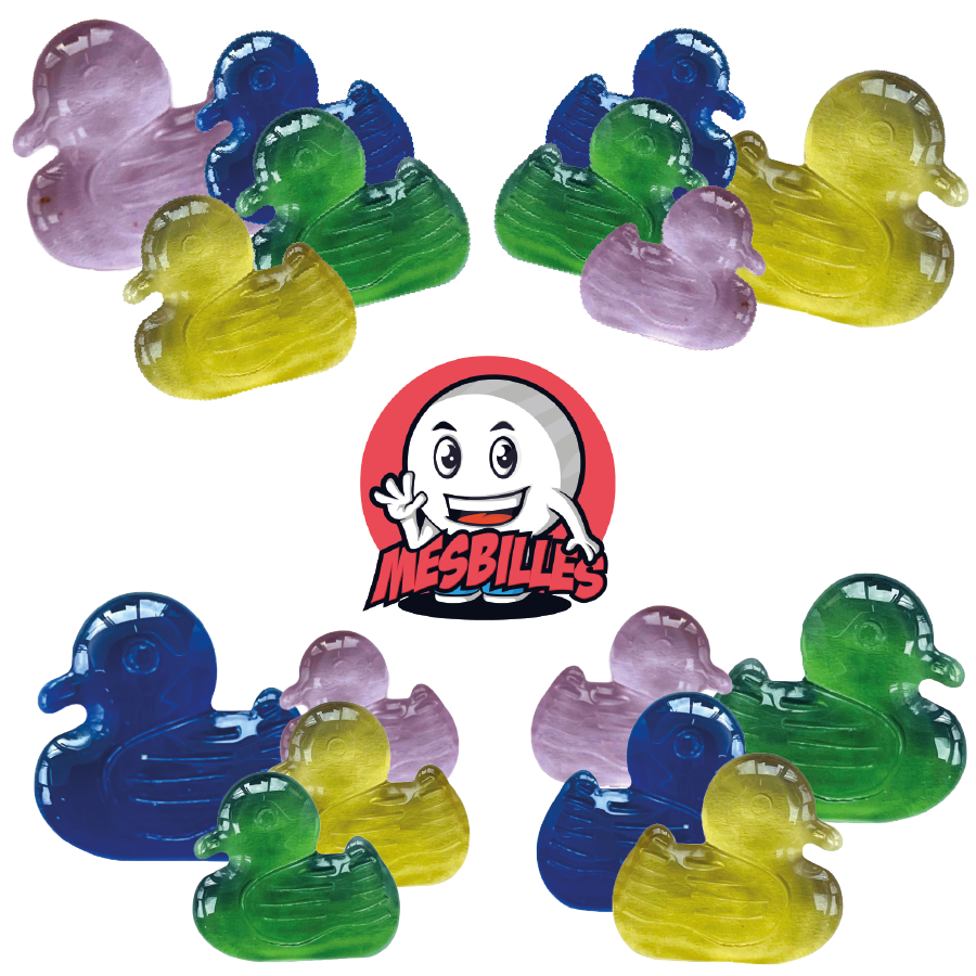 Imagen de la mascota MisCanicas rodeada de canicas Extraplanas Pato Rosa de 25 mm, el flamenco de las canicas Formas en MisCanicas