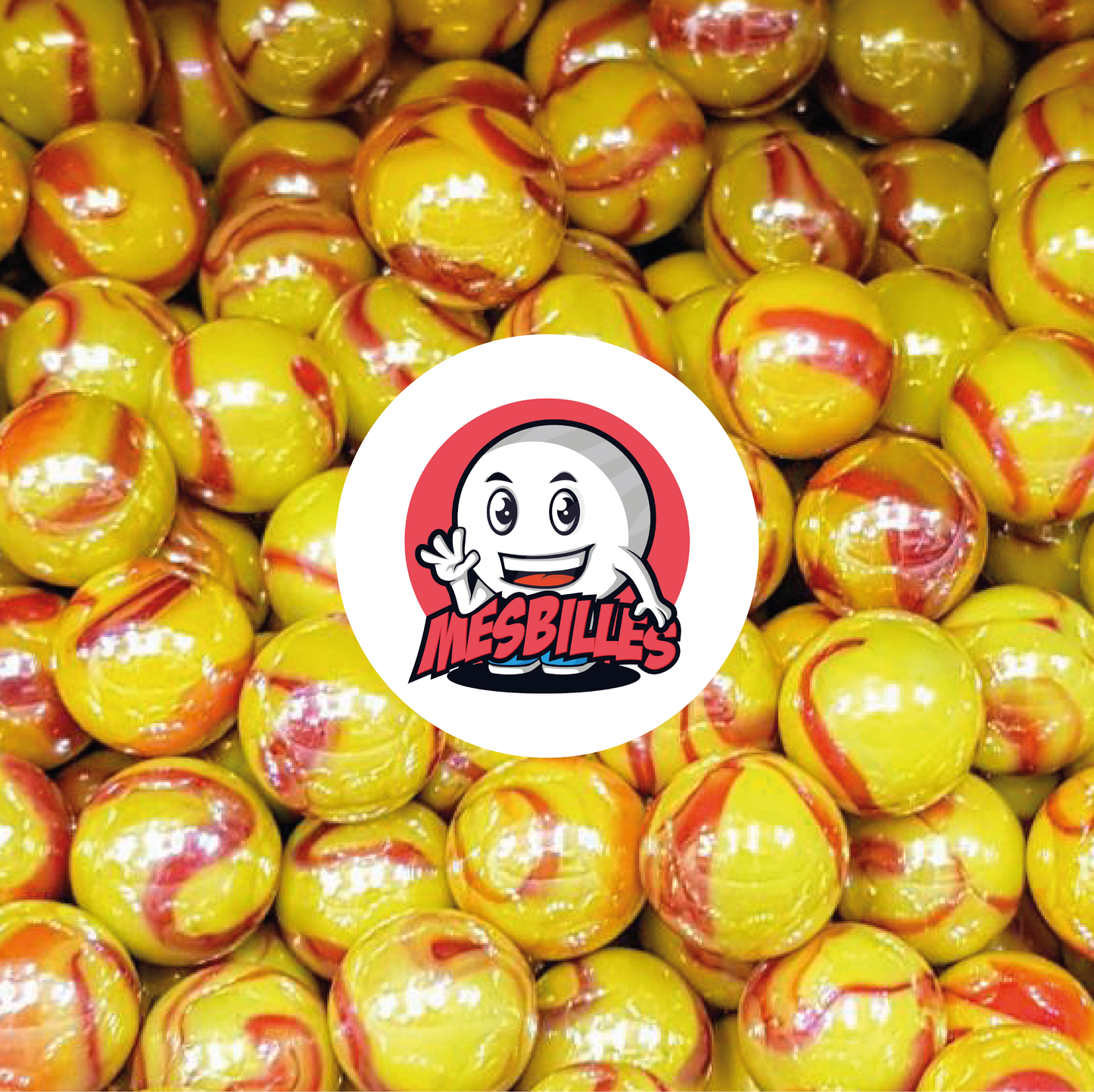 Imagen de la mascota MisCanicas rodeada de canicas Dragón de 14 mm: increíble combinación de amarillo y rojo en un vidrio opaco y brillante