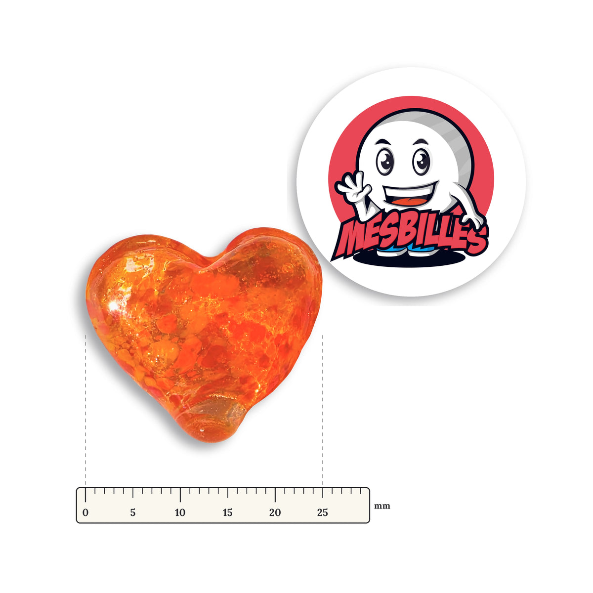 Bille Coeur Cristal Mouchetée Rouge et Orange à côté d'une règle graduée, environ 25 mm de large