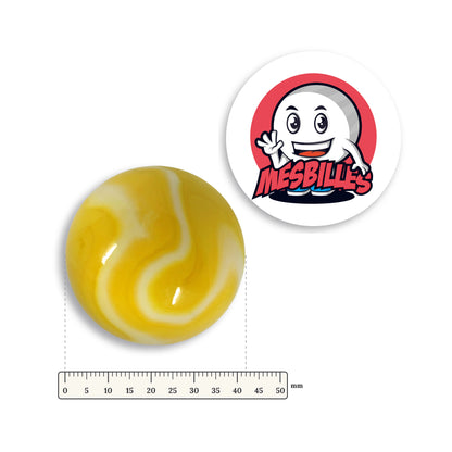 Grande bille Sorbet Citron à côté d'une règle graduée, 42 mm de diamètre