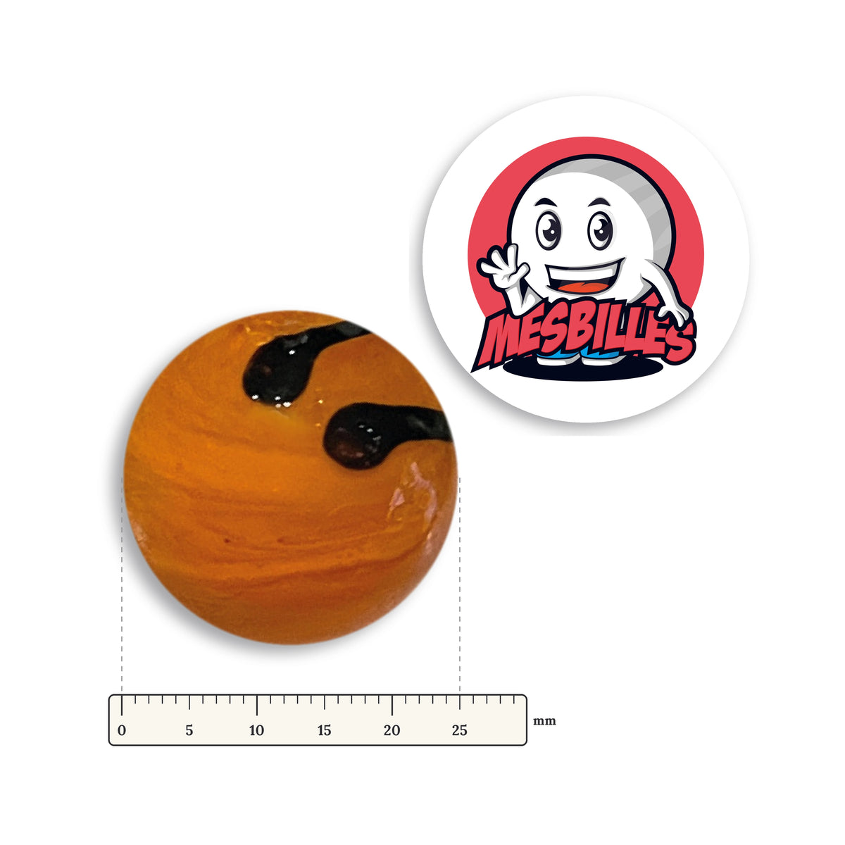 Bille Zébra Orange 25 mm Collector à côté d'une règle graduée, 25 mm de diamètre